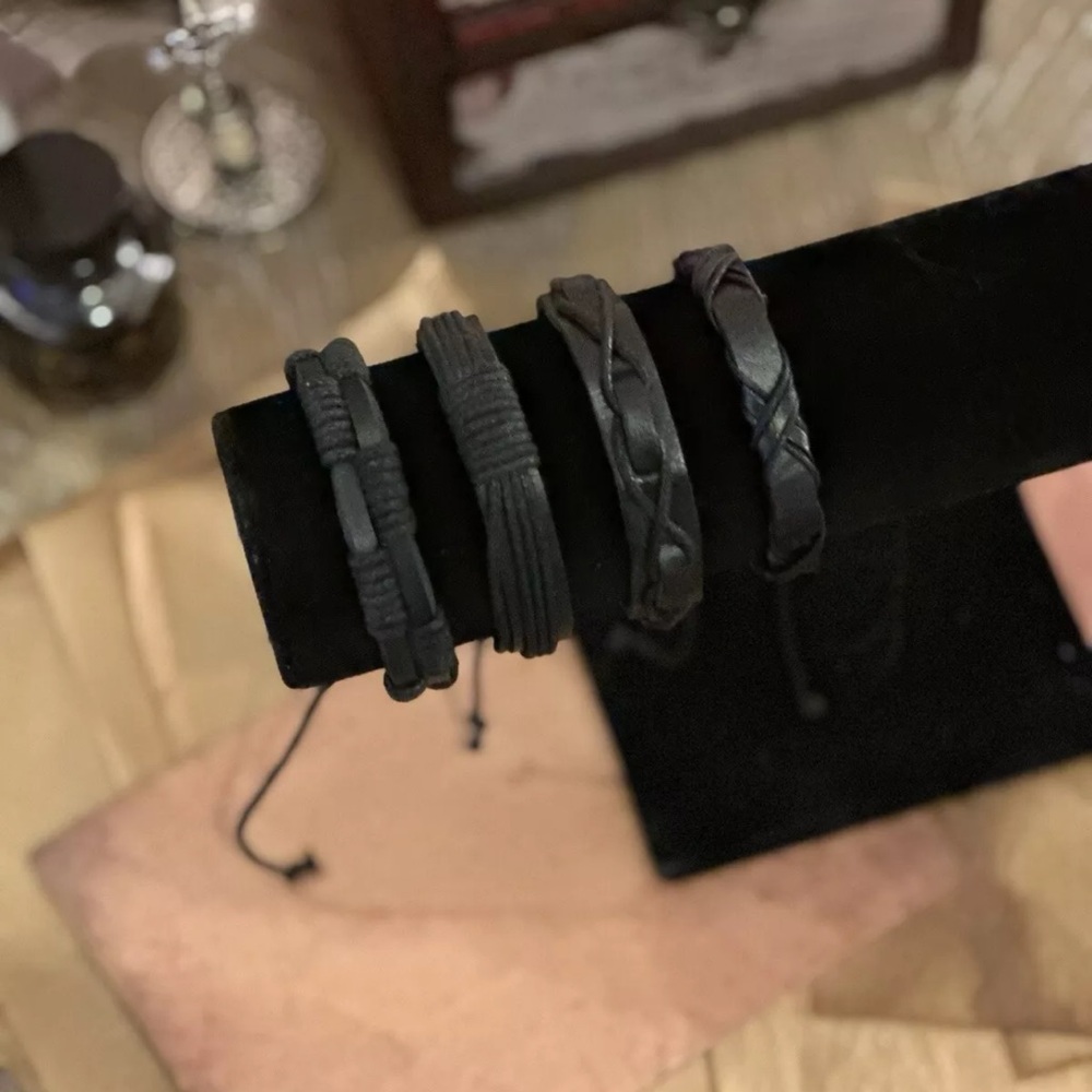 black leather bracelets.